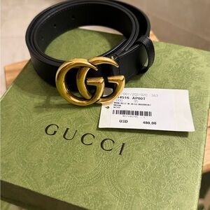 Need to sell fast!!! Gucci Black and Gold Belt
